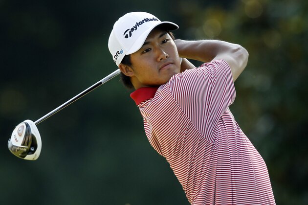 JOHNS CREEK, GA - AUGUST 16:   Gunn Yang watches his tee shot on the ninth hole during the semi-final match of the U.S. Amateur Championship on August 16, 2014 at the Atlanta Athletic Club in Johns Creek, Georgia. (Photo by Butch Dill/Getty Images)