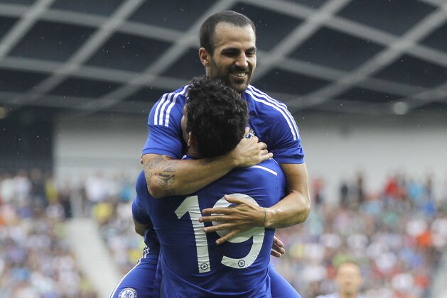 LJUBLJANA, SLOVENIA - JULY 27: Diego Costa of Chelsea celebrate the scoring the goal with Cesc Fabregas (TOP) during the Pre Season Friendly  match between FC Olimpija Ljubljana and Chelsea at Stozice stadium in Ljubljana, Slovenia on Sunday, July 27, 2014. (Photo by Srdjan Stevanovic/Getty Images)