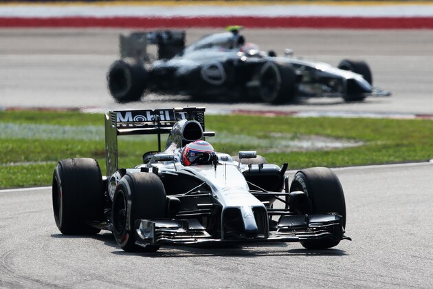 KUALA LUMPUR, MALAYSIA - MARCH 30:  Jenson Button of Great Britain and McLaren drives during the Malaysia Formula One Grand Prix at the Sepang Circuit on March 30, 2014 in Kuala Lumpur, Malaysia.  (Photo by Mark Thompson/Getty Images)