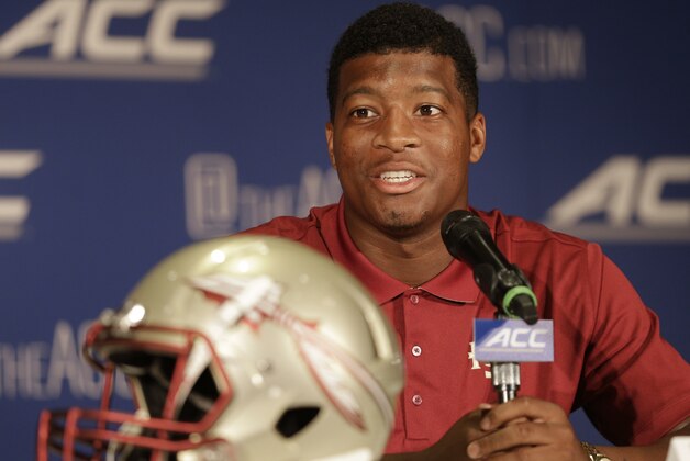 Florida State's Jameis Winston answers a question during a news conference at the Atlantic Coast Conference Football kickoff in Greensboro, N.C., Sunday, July 20, 2014. (AP Photo/Chuck Burton) Florida State's Jameis Winston answers a question during a news conference at the Atlantic Coast Conference Football kickoff in Greensboro, N.C., Sunday, July 20, 2014. (AP Photo/Chuck Burton)