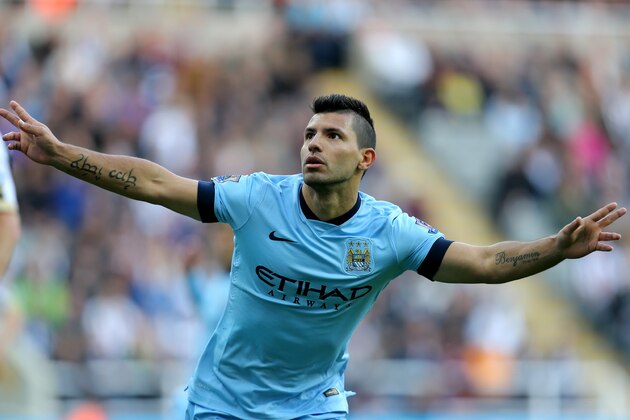 Manchester City's Sergio Aguero celebrates his goal  during their English Premier League soccer match against Newcastle United at St James' Park, Newcastle, England, Sunday, Aug. 17, 2014. (AP Photo/Scott Heppell)