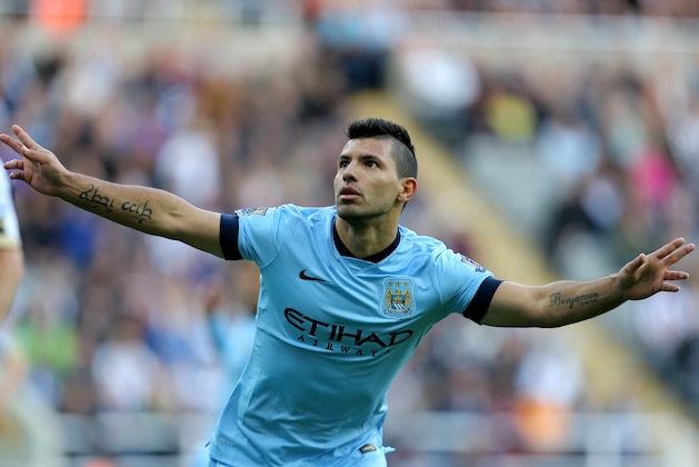 Manchester City's Sergio Aguero celebrates his goal  during their English Premier League soccer match against Newcastle United at St James' Park, Newcastle, England, Sunday, Aug. 17, 2014. (AP Photo/Scott Heppell)
