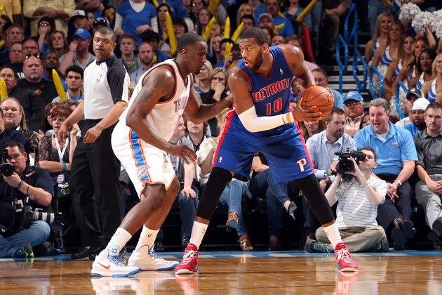 OKLAHOMA CITY, OK - APRIL 16: Greg Monroe #10 of the Detroit Pistons controls the ball against the Oklahoma City Thunder on April 16, 2014 at the Chesapeake Energy Arena in Oklahoma City, Oklahoma. NOTE TO USER: User expressly acknowledges and agrees that, by downloading and or using this Photograph, user is consenting to the terms and conditions of the Getty Images License Agreement. Mandatory Copyright Notice: Copyright 2014 NBAE (Photo by Layne Murdoch/NBAE via Getty Images)