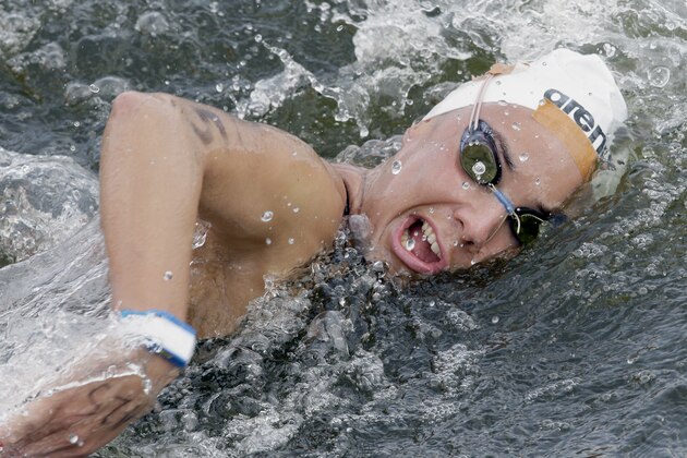 Second placed Anna Olasz from Hungary competes during the women´s 25km open water swim competition at the LEN Swimming European Championships in Berlin, Germany, Sunday, Aug. 17, 2014. (AP Photo/Michael Sohn)