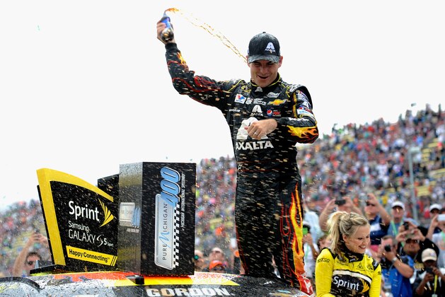 BROOKLYN, MI - AUGUST 17: Jeff Gordon, driver of the #24 Axalta Chevrolet, celebrates in Victory Lane after winning the NASCAR Sprint Cup Series Pure Michigan 400 at Michigan International Speedway on August 17, 2014 in Brooklyn, Michigan.  (Photo by Jared C. Tilton/Getty Images)