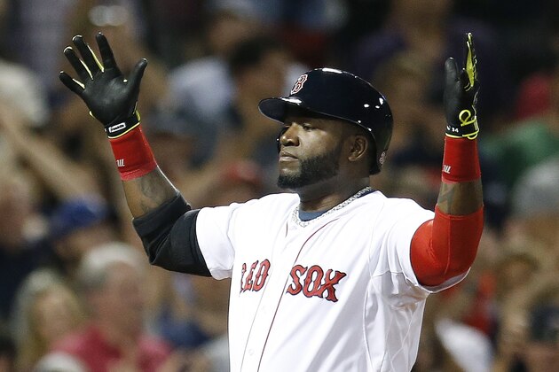 Boston Red Sox's David Ortiz celebrates his two-run home run during the third inning of a baseball game against the Houston Astros in Boston, Saturday, Aug. 16, 2014. (AP Photo/Michael Dwyer)