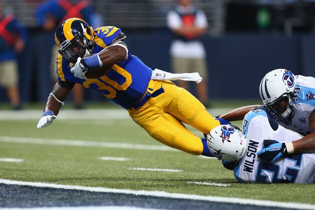ST. LOUIS, MO - NOVEMBER 3: Zac Stacy #30 of the St. Louis Rams scores a touchdown against the Tennessee Titans at the Edward Jones Dome on November 3, 2013 in St. Louis, Missouri.  The Titans beat the Rams 28-21. (Photo by Dilip Vishwanat/Getty Images)