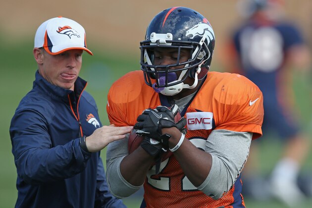 ENGLEWOOD, CO - AUGUST 05:  Running back C.J. Anderson #22 of the Denver Broncos takes part in a drill during practice at the Paul D. Bowlen Memorial Broncos Centre on August 5, 2014 in Englewood, Colorado.  (Photo by Doug Pensinger/Getty Images)