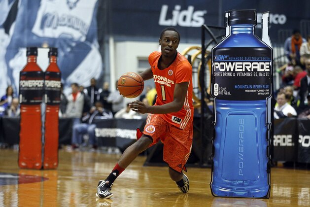 McDonald's East All-American Theo Pinson, of Greensboro, N.C., competes in the skills contest during the McDonald's All-American Jam Fest at the University of Chicago in Chicago, on Monday, March 31, 2014. (AP Photo/Andrew A. Nelles)