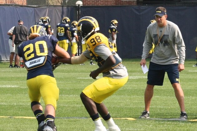 Drake Harris takes the handoff from Devin Gardner