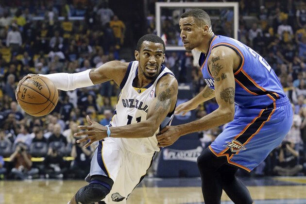 Memphis Grizzlies guard Mike Conley (11) drives against Oklahoma City Thunder guard Thabo Sefolosha during the first half of Game 3 of an opening-round NBA basketball playoff series Thursday, April 24, 2014, in Memphis, Tenn. (AP Photo/Mark Humphrey)