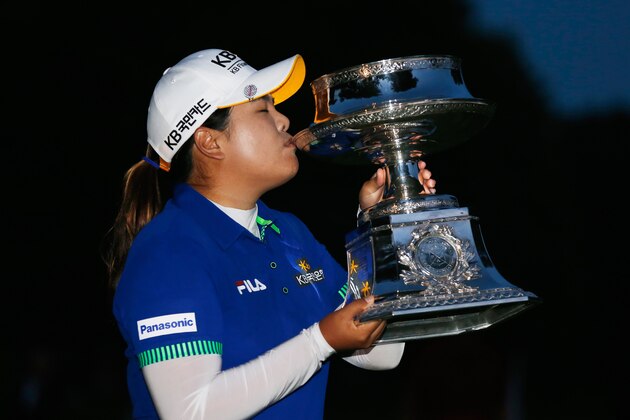 PITTSFORD, NY - AUGUST 17:  Inbee Park of South Korea celebrates with the trophy after winning theWegmans LPGA Championship at Monroe Golf Club on August 17, 2014 in Pittsford, New York.  (Photo by Scott Halleran/Getty Images)