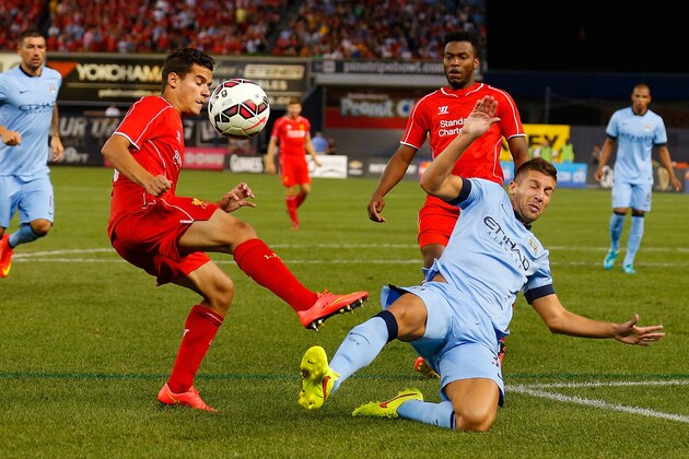NEW YORK, NY - JULY 30: Matija Nastasic #33 of Manchester City and Philippe Coutinho #10 of Liverpool vie for the ball during the International Champions Cup 2014 at Yankee Stadium on July 30, 2014 in the Bronx borough of New York City. (Photo by Mike Stobe/Getty Images) NEW YORK, NY - JULY 30: Matija Nastasic #33 of Manchester City and Philippe Coutinho #10 of Liverpool vie for the ball during the International Champions Cup 2014 at Yankee Stadium on July 30, 2014 in the Bronx borough of New York City. (Photo by Mike Stobe/Getty Images)
