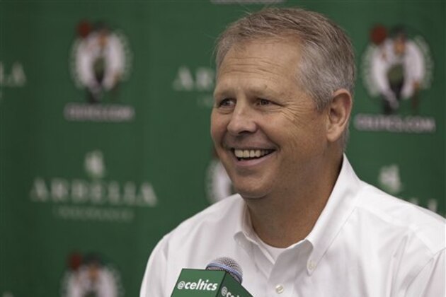 Danny Ainge, president of basketball operations for the Boston Celtics, answers a reporter's question during media day at the NBA basketball team's training center in Waltham, Mass., Friday, Sept. 28, 2012. (AP Photo/Stephan Savoia)