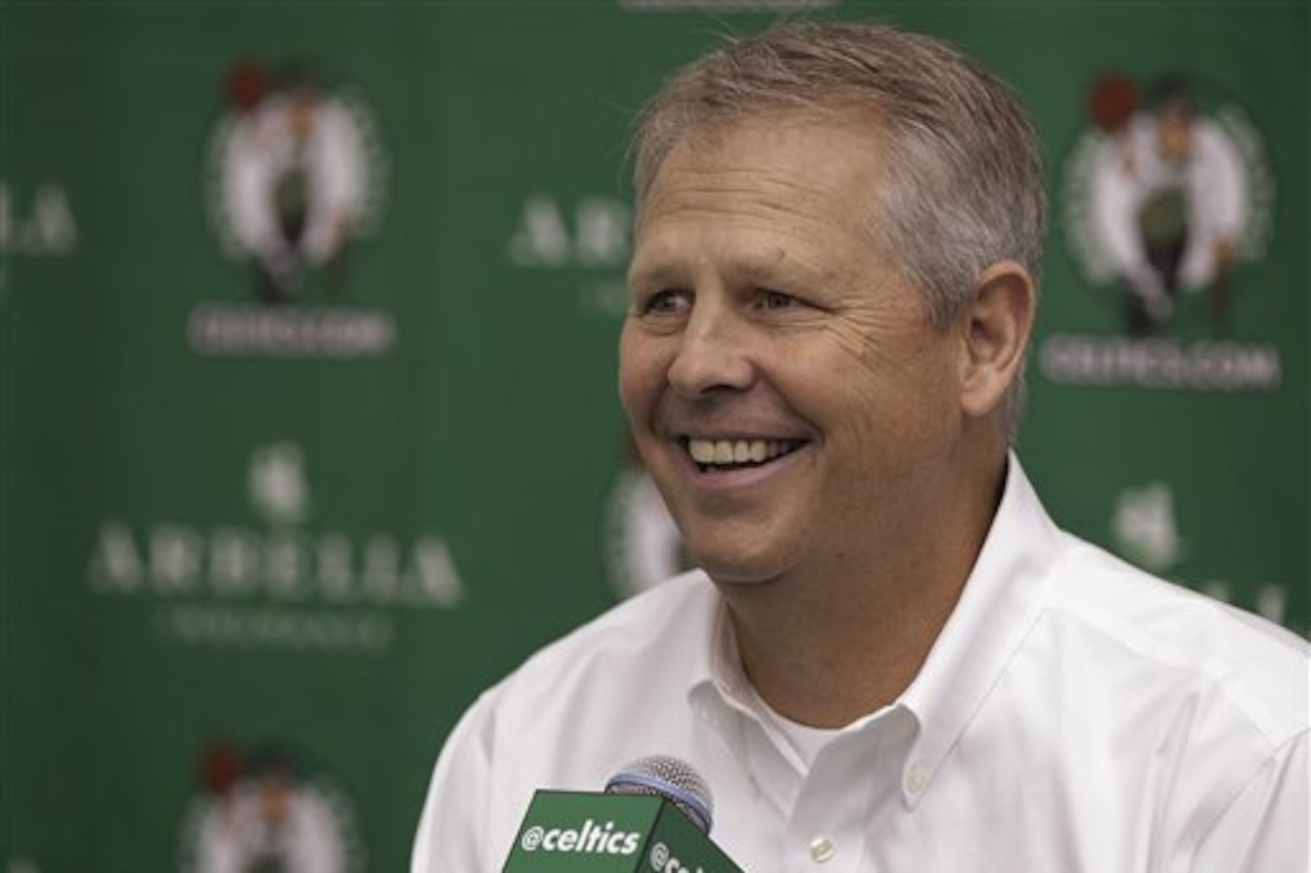 Danny Ainge, president of basketball operations for the Boston Celtics, answers a reporter's question during media day at the NBA basketball team's training center in Waltham, Mass., Friday, Sept. 28, 2012. (AP Photo/Stephan Savoia)