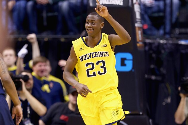 INDIANAPOLIS, IN - MARCH 14:  Caris LeVert #23 of the Michigan Wolverines celebrates in the game against the Illinois Fighting Illini during the Quarterfinals of the Big Ten Basketball Tournament at Bankers Life Fieldhouse on March 14, 2014 in Indianapolis, Indiana.  (Photo by Andy Lyons/Getty Images)