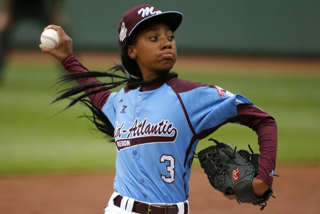 Pennsylvania's  Mo'ne Davis delivers in the fifth inning against Tennessee during a baseball game in United States pool play at the Little League World Series tournament in South Williamsport, Pa., Friday, Aug. 15, 2014. Pennsylvania won 4-0 with Davis pitching a complete game two-hit shutout. AP Photo/Gene J. Puskar)