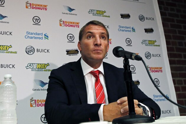 Liverpool F.C. manager Brendan Rodgers listens to a question during a news conference prior to team practice at Fenway Park in Boston, Tuesday, July 22, 2014 in preparation for their friendly soccer match against A.S. Roma scheduled for Wednesday. (AP Photo)