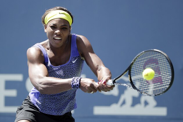 Serena Williams returns to Angelique Kerber, of Germany, during the championship match of the Bank of the West Classic tennis tournament on Sunday, Aug. 3, 2014, in Stanford , Calif. (AP Photo/Marcio Jose Sanchez)
