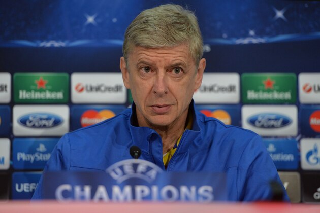 Arsenal's  head coach Arsene Wenger attends a press conference in Munich, southern Germany, Monday, March 10, 2014, ahead of their round of 16 second leg Champions League soccer match against FC Bayern on Tuesday. (AP Photo/Kerstin Joensson)