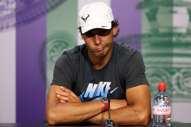 LONDON, ENGLAND - JULY 01:  Rafael Nadal of Spain speaks during a press conference after losing his Gentlemen's Singles fourth round match against Nick Kyrgios of Australia on day eight of the Wimbledon Lawn Tennis Championships at the All England Lawn Tennis and Croquet Club on July 1, 2014 in London, England.  (Photo by Scott Heavey/AELTC - Pool/Getty Images)