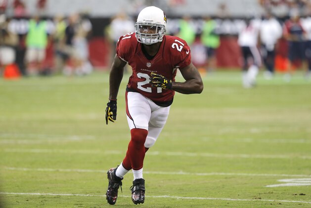 Arizona Cardinals cornerback Patrick Peterson (21) warms up prior to an NFL preseason football game against the Houston Texans, Saturday, Aug. 9, 2014, in Glendale, Ariz. (AP Photo/Rick Scuteri)