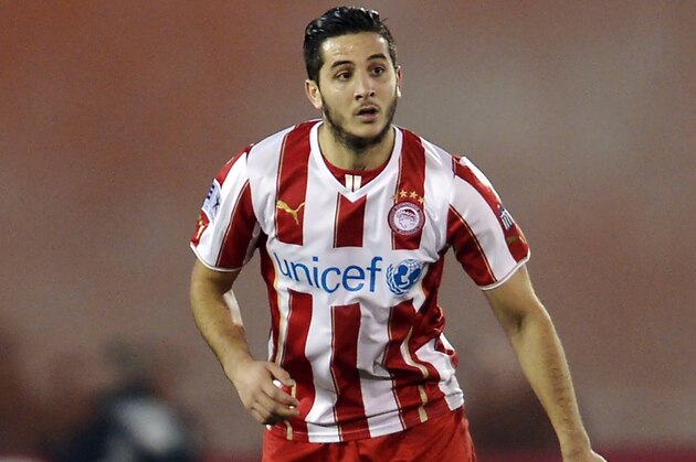 ATHENS,GREECE - JANUARY 12: Kostas Manolas of Olympiacos during the Greek Superleague match between Atromitos Athinon and Olympiacos at the Peristeri Stadium on January 12, 2014 in Athens,Greece. (Photo by Aris Messins/EuroFootball/Getty Images) ATHENS,GREECE - JANUARY 12: Kostas Manolas of Olympiacos during the Greek Superleague match between Atromitos Athinon and Olympiacos at the Peristeri Stadium on January 12, 2014 in Athens,Greece. (Photo by Aris Messins/EuroFootball/Getty Images)