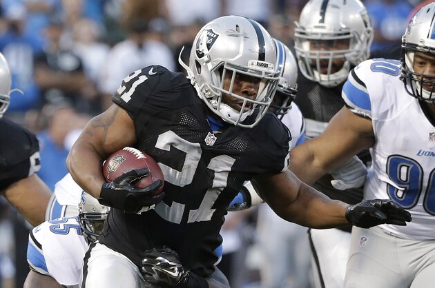 Oakland Raiders running back Maurice Jones-Drew (21) against the Detroit Lions during an NFL preseason football game in Oakland, Calif., Friday, Aug. 15, 2014. (AP Photo/Marcio Jose Sanchez)