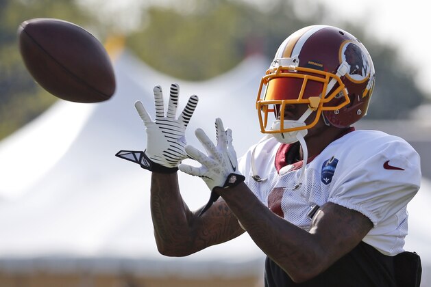 Washington Redskins receiver DeSean Jackson prepares to catch a pass during practice at the team's NFL football training facility, Saturday, July 26, 2014 in Richmond, Va. (AP Photo)