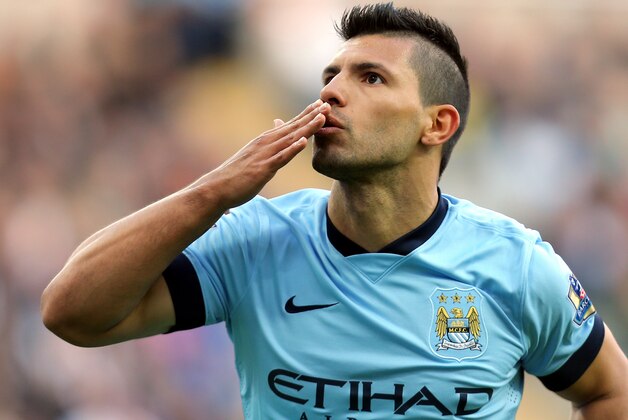 Manchester City's Sergio Aguero celebrates his goal  during their English Premier League soccer match against Newcastle United at St James' Park, Newcastle, England, Sunday, Aug. 17, 2014. (AP Photo/Scott Heppell)