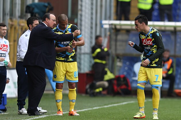 Napoli forward Jose' Maria Bueno Callejon, right, holds a pacifier to celebrate after scoring a goal as coach Rafael Benitez looks at him during a Serie A soccer match between Sampdoria and Napoli, in Genoa, Italy, Sunday, May 11, 2014. (AP Photo/Carlo Baroncini)