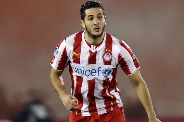 ATHENS,GREECE - JANUARY 12:  Kostas Manolas of Olympiacos during the Greek Superleague match between Atromitos Athinon and Olympiacos at the Peristeri Stadium on January 12, 2014 in Athens,Greece.  (Photo by Aris Messins/EuroFootball/Getty Images)