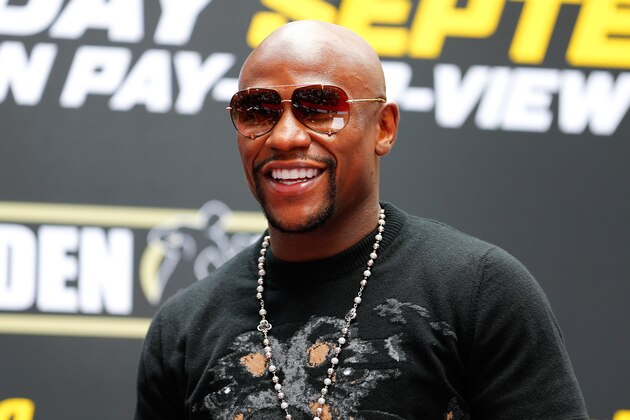 NEW YORK, NY - JULY 14:  Floyd Mayweather Jr. ilooks on during a news conference at the Pedestrian Walk in Times Square on July 14, 2014 in New York City. Floyd Mayweather Jr. and Marcos Maidana are scheduled to fight September 13, 2014 at the MGM Grand in Las Vegas.  (Photo by Mike Stobe/Getty Images)
