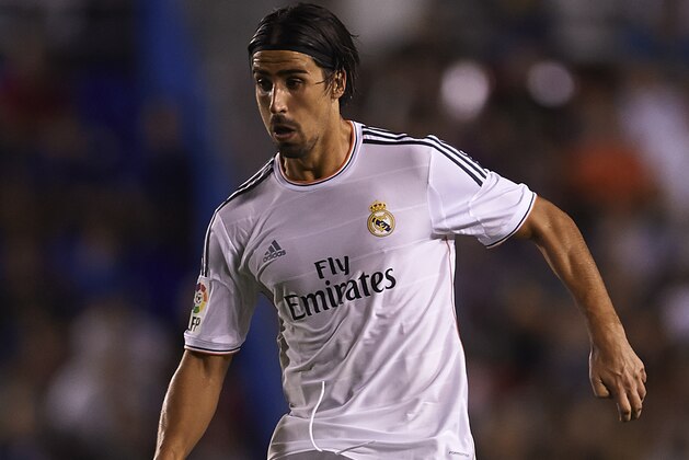 VALENCIA, SPAIN - OCTOBER 05:  Sami Khedira of Real Madrid runs with the ball during the La Liga match between Levante UD and Real Madrid at Ciutat de Valencia on October 5, 2013 in Valencia, Spain.  (Photo by Manuel Queimadelos Alonso/Getty Images)