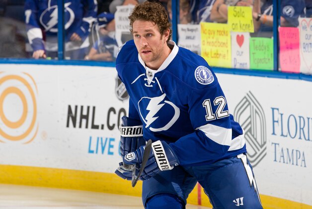 TAMPA, FL - OCTOBER 15: Ryan Malone #12 of the Tampa Bay Lightning skates during warmups before tonight's game against the Los Angeles Kings at the Tampa Bay Times Forum on October 15, 2013 in Tampa, Florida.  (Photo by Scott Audette/NHLI via Getty Images)