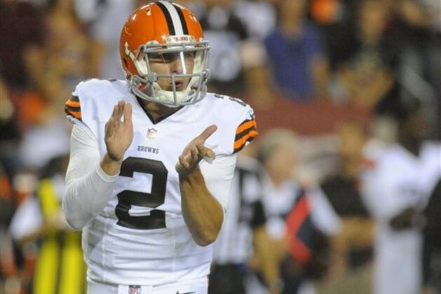 Cleveland Browns quarterback Johnny Manziel (2) reacts during the first half of an NFL preseason football game against the Washington Redskins Monday, Aug. 18, 2014, in Landover, Md. (AP Photo/Richard Lipski)