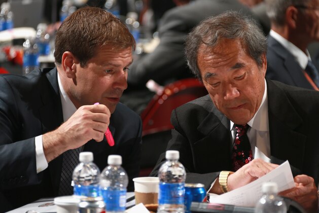 PHILADELPHIA, PA - JUNE 27:  Assistant General Manager and Assistant Coach Doug Weight speaks to team owner Charles Wang of the New York Islanders during the 2014 NHL Entry Draft at Wells Fargo Center on June 27, 2014 in Philadelphia, Pennsylvania.  (Photo by Dave Sandford/NHLI via Getty Images)