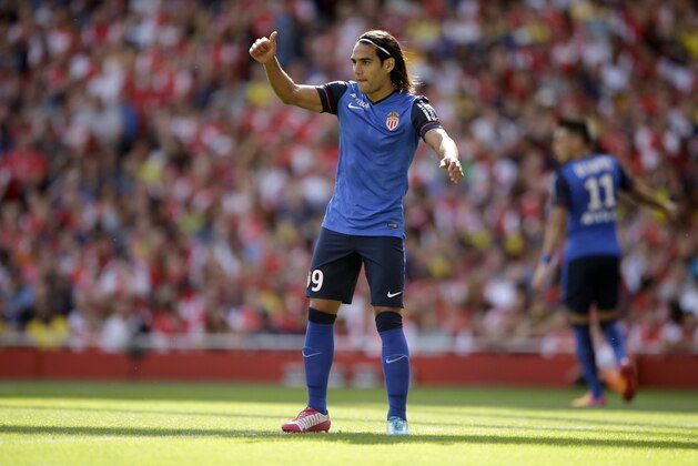 AS Monaco's Radamel Falcao gives a thumbs up during the Emirates Cup soccer match between Arsenal and AS Monaco at Arsenal's Emirates Stadium in London, Sunday, Aug. 3, 2014.  (AP Photo/Matt Dunham)