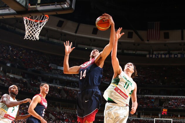 CHICAGO, IL - AUGUST 16: Anthony Davis #14 of the USA Basketball Men's National Team rebounds against Anderson Varejaov#11 of the Brazil Basketball Men's National Team on August 16, 2014 at the United Center in Chicago, Illinois.  NOTE TO USER: User expressly acknowledges and agrees that, by downloading and/or using this Photograph, user is consenting to the terms and conditions of the Getty Images License Agreement. Mandatory Copyright Notice: Copyright 2014 NBAE (Photo by Nathaniel S. Butler/NBAE via Getty Images)