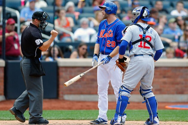 NEW YORK, NY - AUGUST 17:  Eric Campbell #29 of the New York Mets argues with home plate umpire Will Little after he was called out on strikes to end the game as John Baker #12 of the Chicago Cubs looks on at Citi Field on August 17, 2014 in the Flushing neighborhood of the Queens borough of New York City.  (Photo by Jim McIsaac/Getty Images)