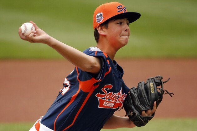 Tennessee's Blake Money delivers during the first inning of a baseball game against Pennsylvania in United States pool play at the Little League World Series tournament in South Williamsport, Pa., Friday, Aug. 15, 2014. Pennsylvania won 4-0. (AP Photo/Gene J. Puskar)