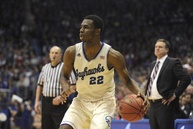 Feb 15, 2014; Lawrence, KS, USA; Kansas Jayhawks guard Andrew Wiggins (22) moves the ball against the TCU Horned Frogs in the second half at Allen Fieldhouse. Kansas won the game 95-65. Mandatory Credit: John Rieger-USA TODAY Sports
