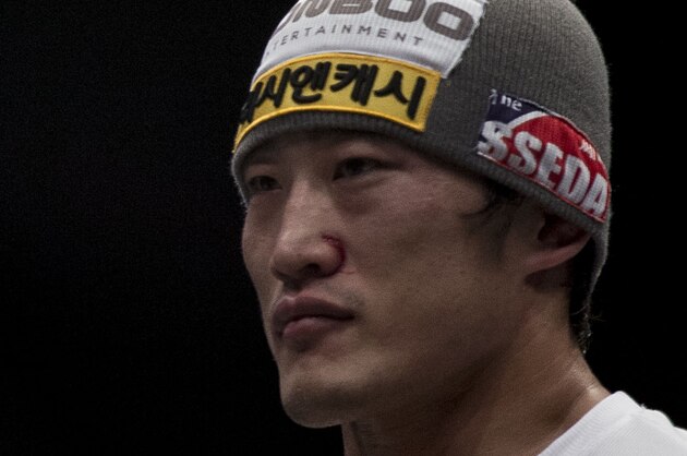 MACAU - MARCH 01:  Dong Hyun Kim of South Korea looks on the octagon after defeating John Hathaway of England by knockout in their welterweight bout during the UFC Fight Night at the Cotai Arena on March 1, 2014 in Macau, China.  (Photo by Victor Fraile/Getty Images)