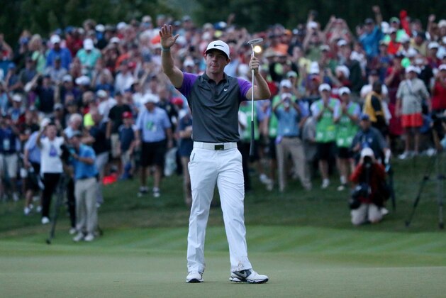 LOUISVILLE, KY - AUGUST 10:  Rory McIlroy of Northern Ireland celebrates his one-stroke victory on the 18th green during the final round of the 96th PGA Championship at Valhalla Golf Club on August 10, 2014 in Louisville, Kentucky.  (Photo by Andrew Redington/Getty Images)