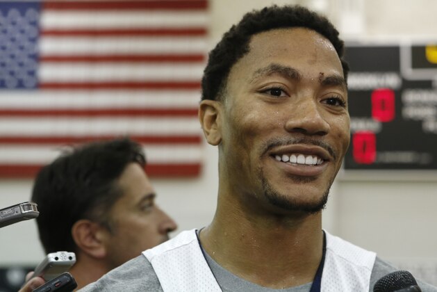 USA Basketball guard Derrick Rose of the Chicago Bulls speaks to the press after a team practice at the Brooklyn Nets training facility in East Rutherford, N.J., Tuesday, Aug. 19, 2014. Team USA faces the Dominican Republic at Madison Square Garden Wednesday night in advance of the FIBA World Cup Basketball tournament Aug. 30 through Sept. 14 in Spain. (AP Photo/Kathy Willens)