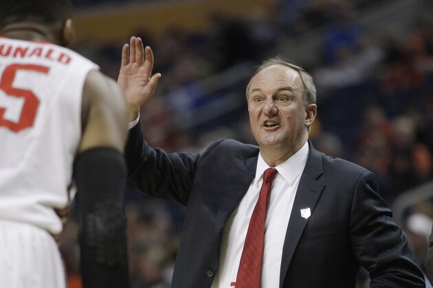Ohio State head coach Thad Matta calls out to his team during the first half of a second-round game against the Dayton in the NCAA college basketball tournament in Buffalo, N.Y., Thursday, March 20, 2014. (AP Photo/Bill Wippert)