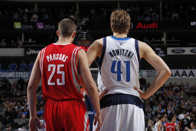 DALLAS, TX - JANUARY 29: Dirk Nowitzki #41 of the Dallas Mavericks and Chandler Parsons #25 of the Houston Rockets on January 29, 2014 at the American Airlines Center in Dallas, Texas. NOTE TO USER: User expressly acknowledges and agrees that, by downloading and or using this photograph, User is consenting to the terms and conditions of the Getty Images License Agreement. Mandatory Copyright Notice: Copyright 2014 NBAE (Photo by Glenn James/NBAE via Getty Images)