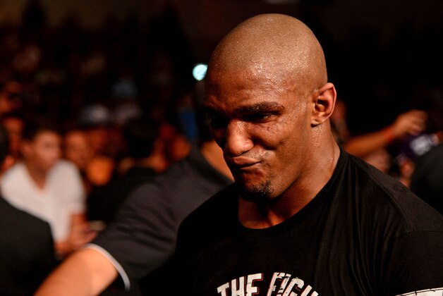 Feb 15, 2014; Jaragua do Sul, SC, Brazil; Francis Carmont (blue gloves) reacts after being defeated by Ronaldo Souza (red gloves) during UFC Fight Night Machida vs Mousasi at Arena Jaragua. Mandatory Credit: Jason Silva-USA TODAY Sports