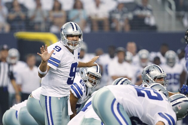 Dallas Cowboys quarterback Tony Romo (9) in action against the Baltimore Ravens during the first half of an NFL preseason football game Saturday, Aug. 16, 2014, in Arlington, Texas. (AP Photo/Kiichiro Sato)