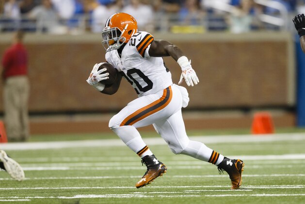 Cleveland Browns running back Terrance West (20) runs the ball against the Detroit Lions during a preseason NFL football game at Ford Field in Detroit, Saturday, Aug. 9, 2014. (AP Photo/Rick Osentoski)